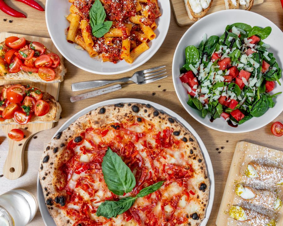 Pizza, pasta and salads spread